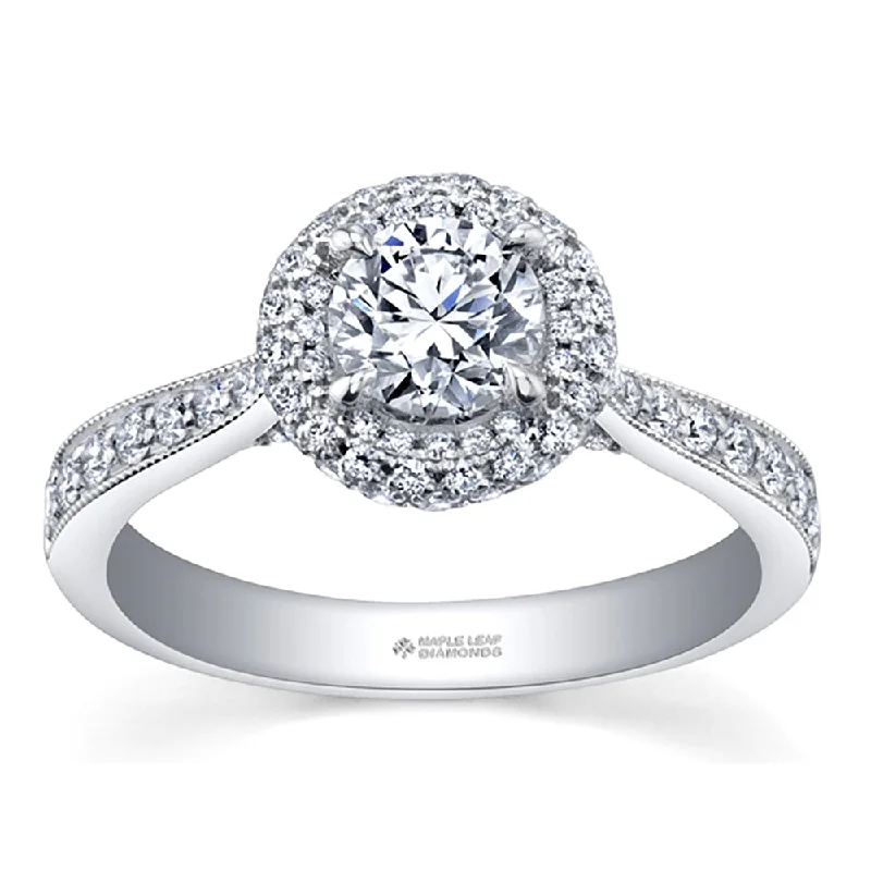 Cathedral - Style Women's Diamond Rings with a Raised Center Setting and Elaborate MetalworkCanadian Round Diamond Ring with Milgrain Detailing