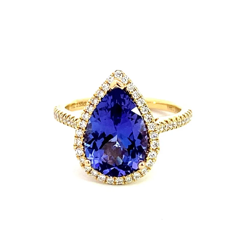 Bohemian - Style Fashion Rings with Turquoise and Silver Filigree for a Free - Spirited Look18K Yellow Gold Diamond Halo Pear Tanzanite Ring