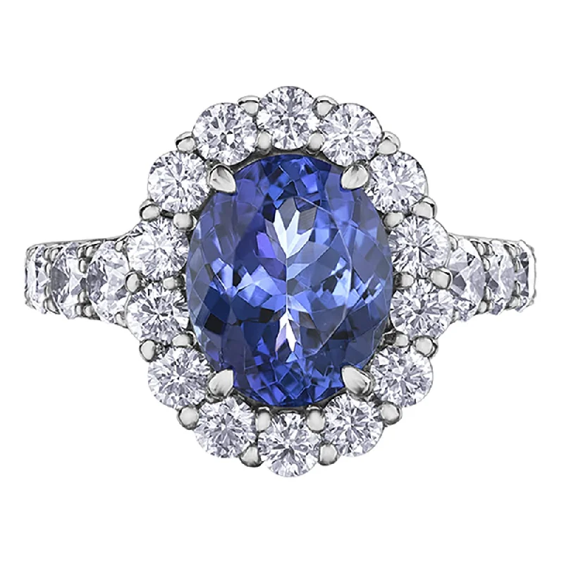 Cushion - Cut Women's Diamond Rings in Platinum with a Soft and Romantic AppearanceOval Tanzanite and Diamond Halo Ring