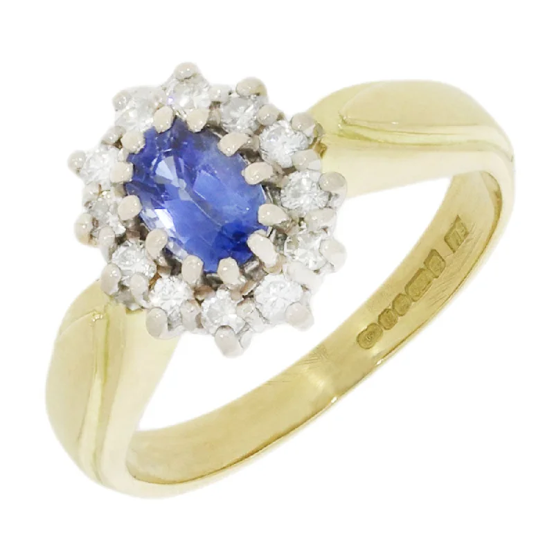 Art Deco - Inspired Women's Diamond Rings with Geometric Designs and Baguette - Cut DiamondsPre Owned 18ct Yellow Gold Sapphire And 0.25cts Diamond Cluster Ring