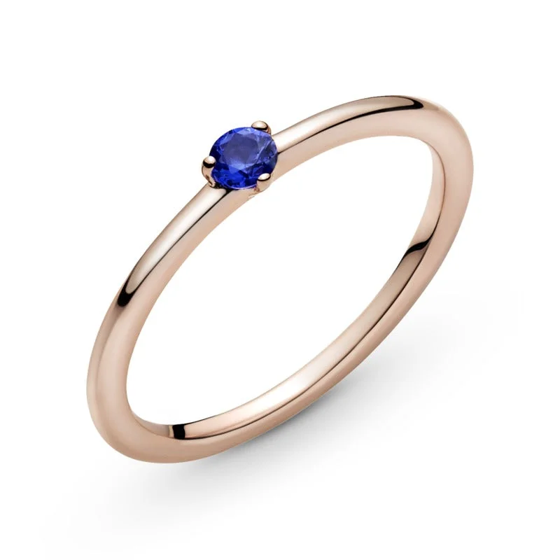 Geometric - Shaped Fashion Rings in Titanium with Iridescent InlaysPandora Rose Solitaire Ring With Stellar Blue Crystal