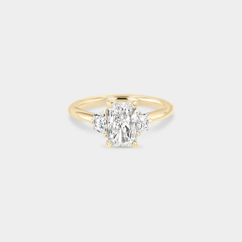 Women's Solitaire Diamond Rings with Round - Cut Diamonds and Platinum Settings for an Elegant EngagementThree Stone of Radiant Diamond