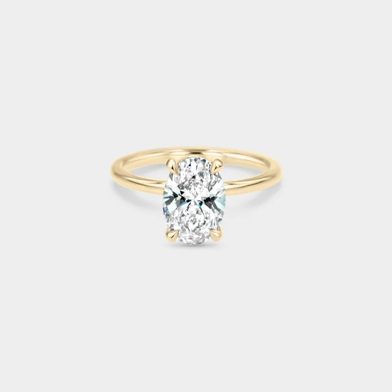 Channel - Set Women's Diamond Rings with Diamonds Securely Held in a Metal Groove for DurabilitySolitaire of Oval Diamond