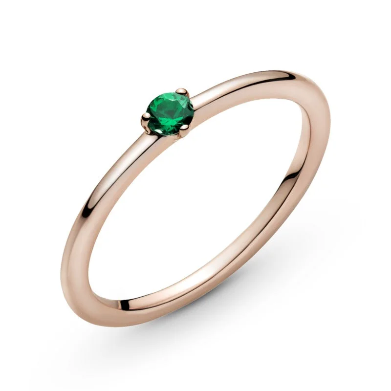 Magnetic Fashion Rings in Stainless Steel with a Modern, Interlocking DesignPandora Rose Solitaire Ring With Lake Green Crystal