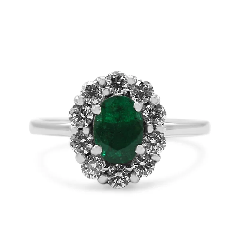 Women's Diamond Rings with Side - Stone Pave Setting for a Sparkling and Continuous ShinePlatinum Diamond & Emerald Oval Cluster Ring