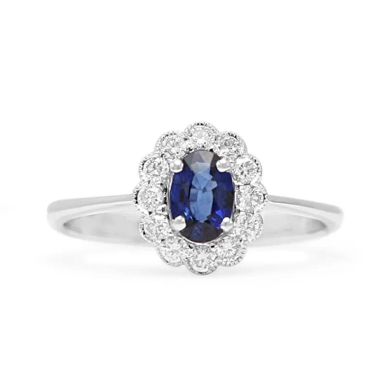 Women's Diamond Rings with Sapphire Accents in Blue for a Colorful and Sophisticated Touch18ct White Gold Diamond & Sapphire Cluster Ring