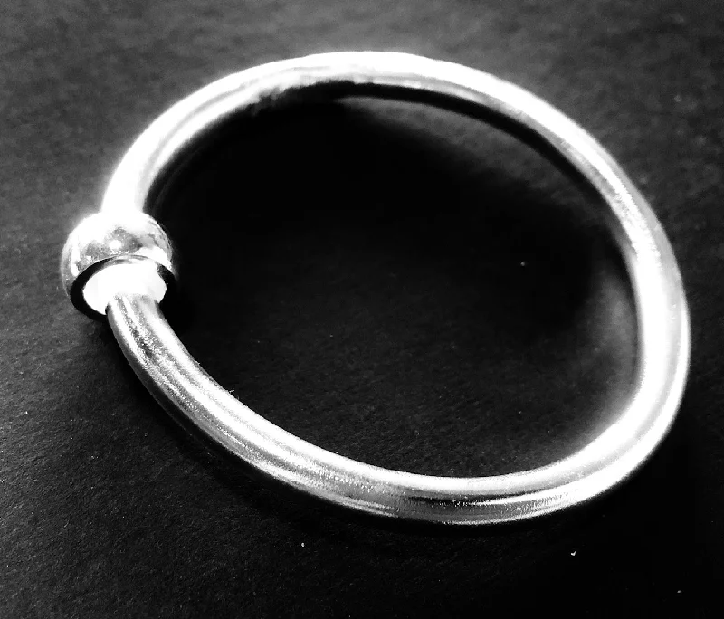 Stretch Bangle Bracelets with Elastic Cord for a Comfortable FitClassic silver bangle with bead