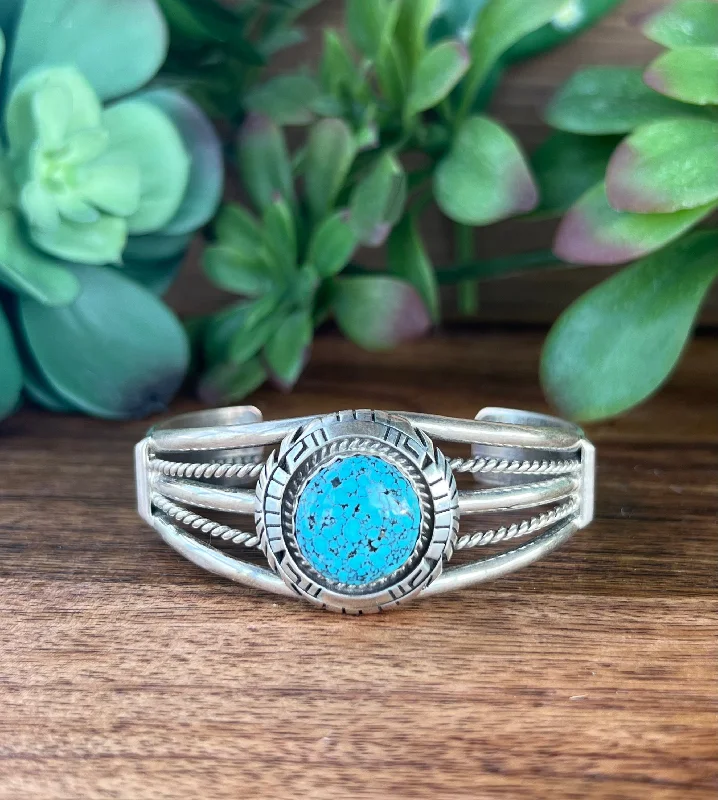 Adjustable Women's Elastic Cuff Bracelets with Pearl Accents for a Feminine TouchRobert Shakey Kingman Web Turquoise & Sterling Silver Cuff Bracelet