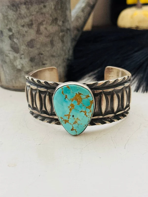 Women's Cuff Bracelets with Hamsa Hand Charms for Protection and Good LuckJerold Tahe Kingman Turquoise & Sterling Silver Cuff Bracelet