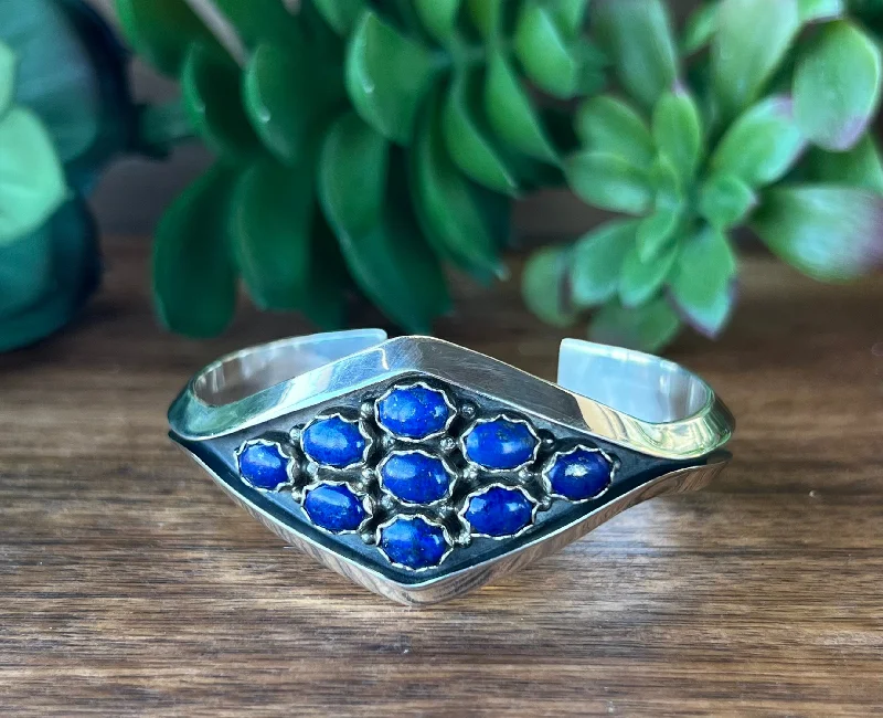 Adjustable Women's Elastic Cuff Bracelets with Pearl Accents for a Feminine TouchMary Ann Spencer Lapis & Sterling Silver Cuff Bracelet