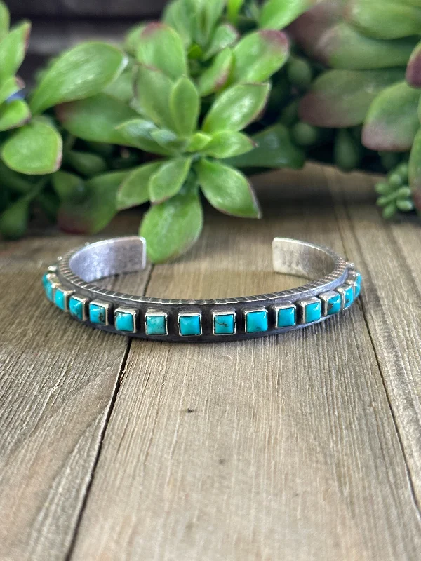 Adjustable Women's Elastic Cuff Bracelets with Pearl Accents for a Feminine TouchNavajo Made Kingman Turquoise & Sterling Silver Cuff Bracelet