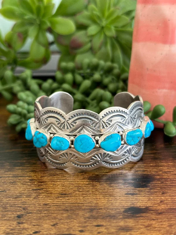 Wooden Women's Cuff Bracelets with Carved Motifs for a Natural and Artistic LookNavajo Made Kingman Turquoise & Sterling Silver Cuff Bracelet