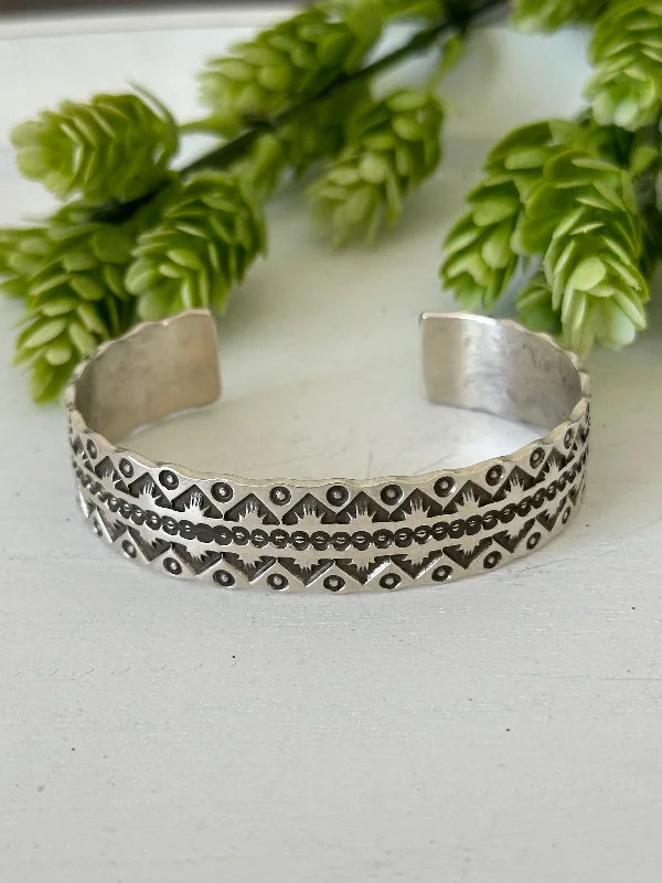 Women's Sterling Silver Cuff Bracelets with Engraved Floral Patterns for a Romantic LookNavajo Made Sterling Silver Cuff Bracelet