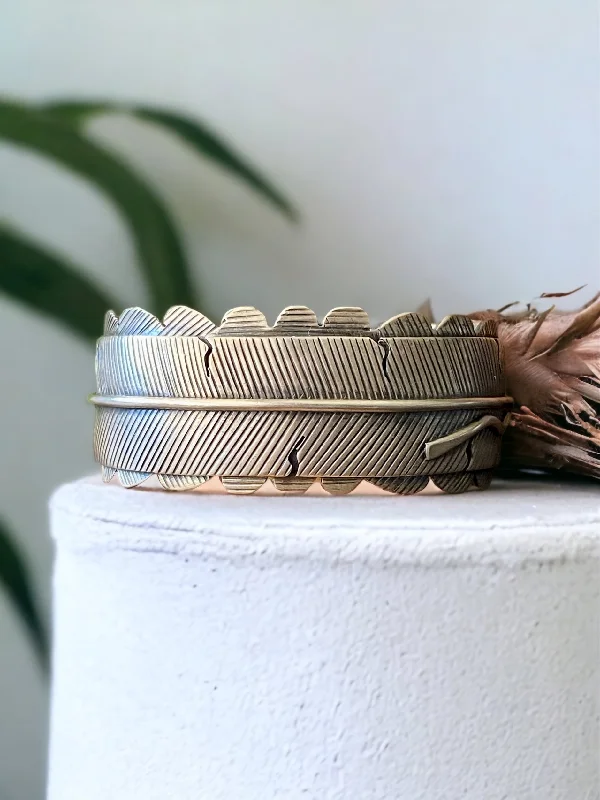 Women's Cuff Bracelets with Tassel Decorations for a Boho - Chic StyleVintage Lorenzo Juan Sterling Silver Feather Cuff Bracelet