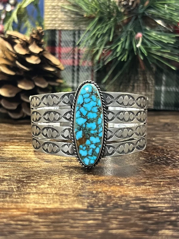 Women's Cuff Bracelets with Hamsa Hand Charms for Protection and Good LuckNavajo Made High Grade Kingman & Sterling Cuff Bracelet