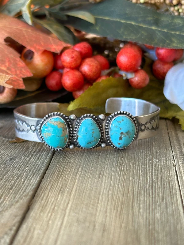 Women's Cuff Bracelets with Tassel Decorations for a Boho - Chic StyleNavajo Made Kingman Turquoise & Sterling Silver Cuff Bracelet