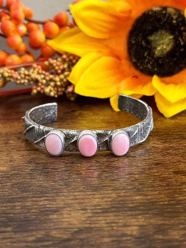 Large - Sized Women's Leather Cuff Bracelets with Studded Details for a Punk - Rock VibeWilson Dawes Pink Conch & Sterling Silver Tufa Cast Cuff Bracelet