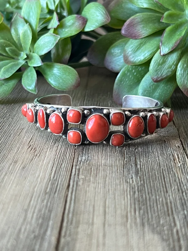 Women's Cuff Bracelets with Celtic Knot Patterns for a Mysterious and Cultural AppealB Begay Mediterranean Coral & Sterling Silver Cuff Bracelet