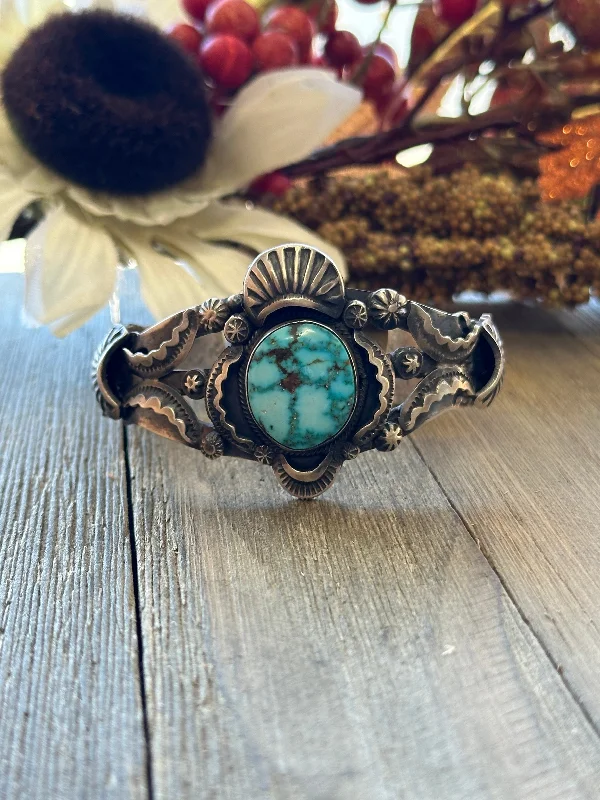 Women's Cuff Bracelets with Celtic Knot Patterns for a Mysterious and Cultural AppealGilbert Tom High Grade Kingman Turquoise & Sterling Silver Cuff Bracelet