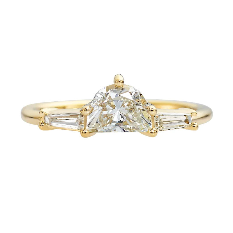 Cathedral - Style Engagement Rings with a Raised Center Stone and Intricate MetalworkHalf Moon Diamond Ring with Tapered Baguette Beams