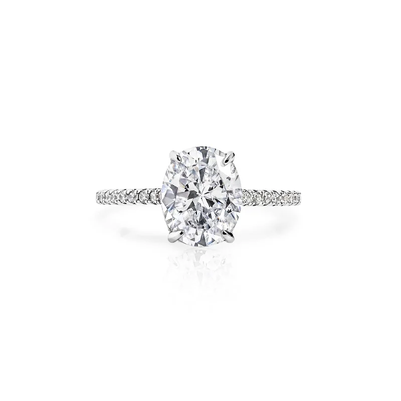 Classic Round Cut Engagement Rings with Platinum Prongs and Halo Setting for Timeless EleganceHIDDEN HALO ENGAGEMENT RING