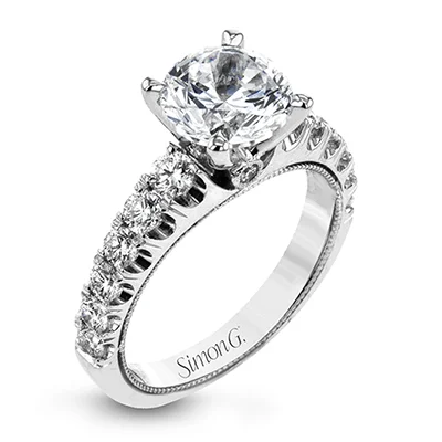 Classic Round Cut Engagement Rings with Platinum Prongs and Halo Setting for Timeless EleganceSimon G. Round Diamond Engagement Ring