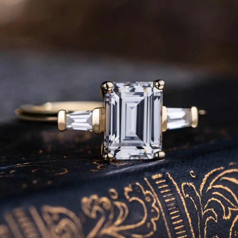 Adjustable Engagement Rings with a Flexible Band and a Princess - Cut Center DiamondThe Charlotte - Three Stone Emerald Cut Diamond Engagement Ring