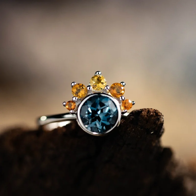 Halo Engagement Rings with a Cushion - Cut Center Diamond and Rose Gold BandThe Cosset - London Blue Topaz Engagement Ring with Citrine Crown Accent & Bezel Setting