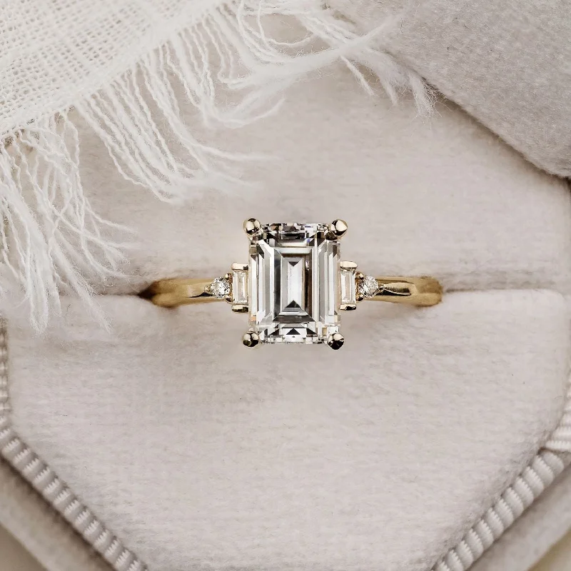 Emerald Cut Engagement Rings with Platinum Gallery and Split Shank DesignThe Isabella - Emerald Diamond Engagement Ring with Baguette and Round Diamond Accents