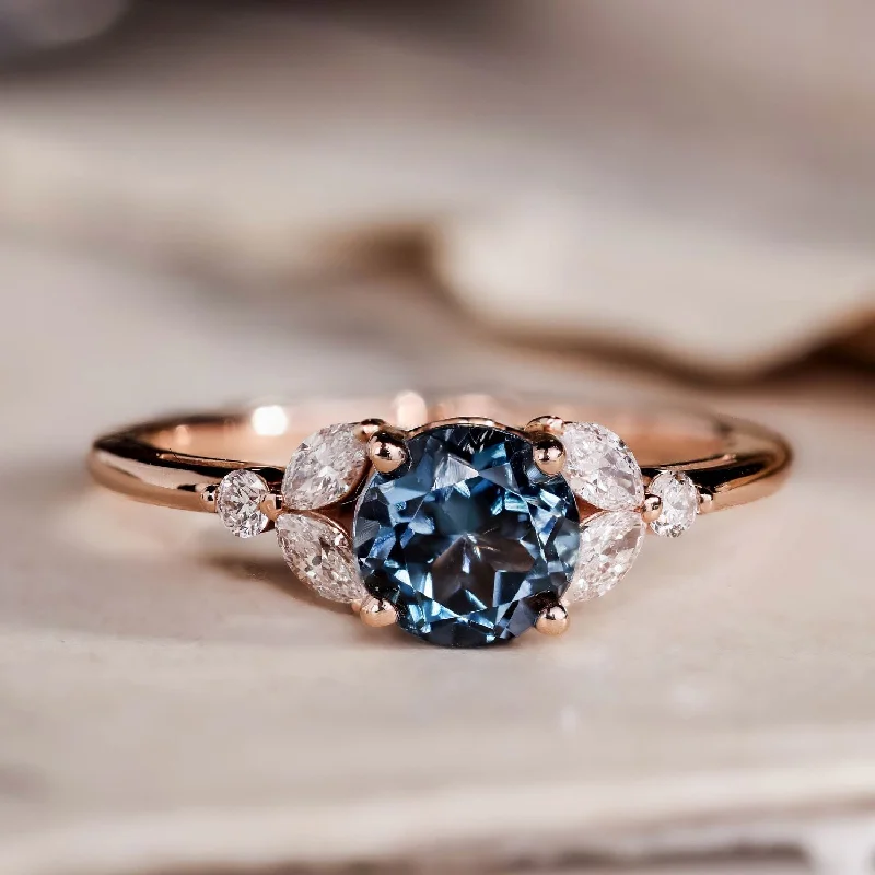 Classic Round Cut Engagement Rings with Platinum Prongs and Halo Setting for Timeless EleganceThe Laurel - London Blue Topaz Nature Inspired Engagement Ring with Diamond Accent Stones