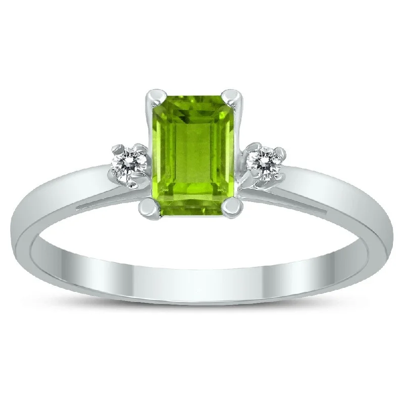 Aquamarine Gemstone Rings in 9K Gold with a Bezel Setting for a Modern and Secure FitEmerald Cut 6X4MM Peridot and Diamond Three Stone Ring in 10K White Gold