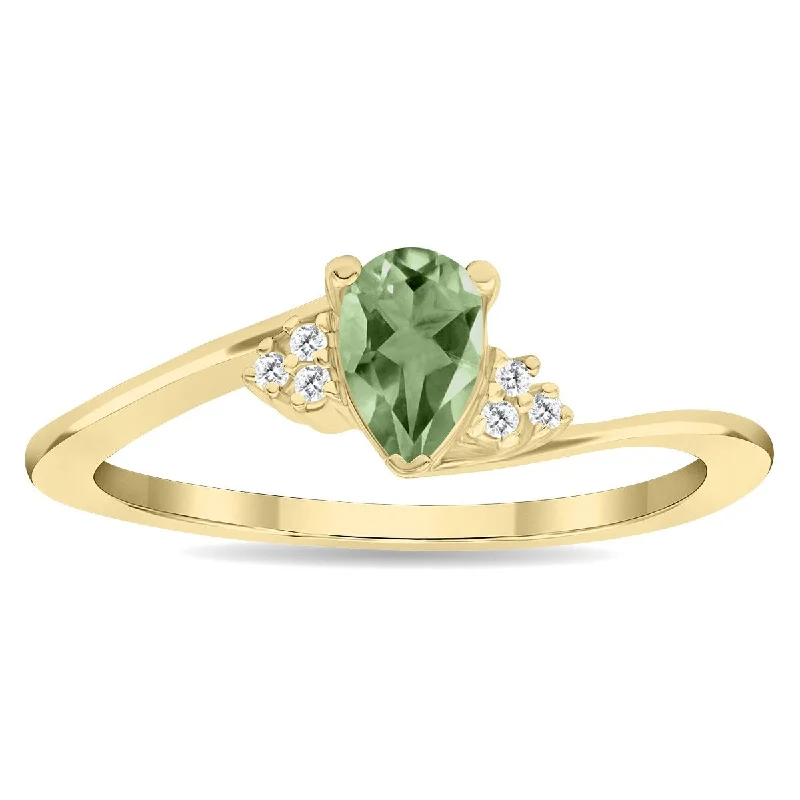 Malachite Gemstone Rings in 14K Gold with a Carved Stone for a Unique and Artistic AppealWomen's Pear Shaped Green Amethyst and Diamond Tierra Ring in 10K Yellow Gold