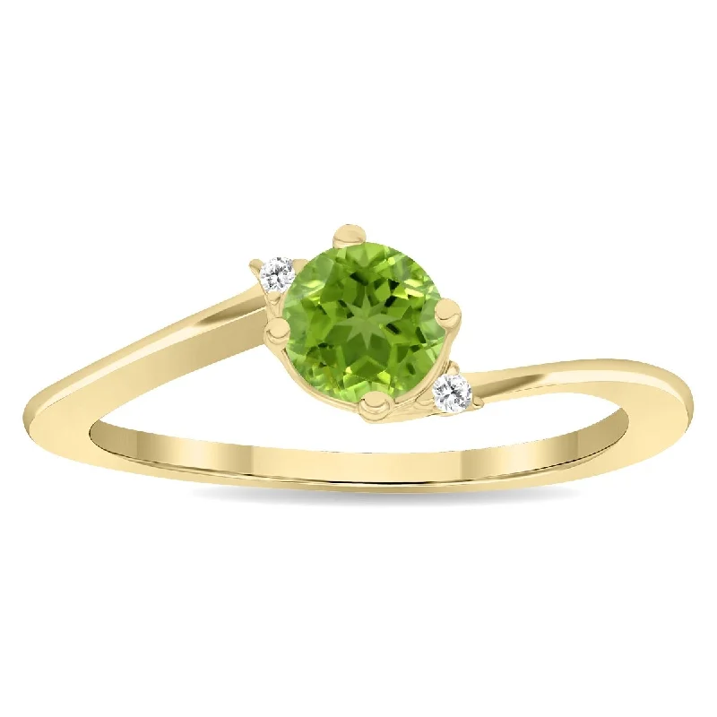 Opal Gemstone Rings in Rose Gold with a Milgrain Edge for a Feminine and Romantic StyleWomen's Round Shaped Peridot and Diamond Wave Ring in 10K Yellow Gold