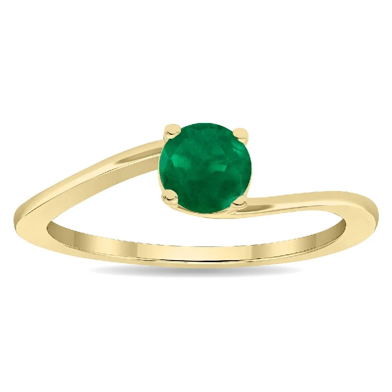 Alexandrite Gemstone Rings in Platinum with a Hidden Halo for a Rare and Luxurious PieceWomen's Round Shaped Solitaire Emerald Wave Ring in 10K Yellow Gold