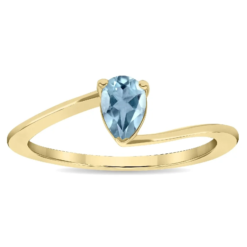 Tanzanite Gemstone Rings in 10K Gold with a Trilogy Design for a Sophisticated GiftWomen's Solitaire Pear Shaped Aquamarine Wave Ring in 10K Yellow Gold